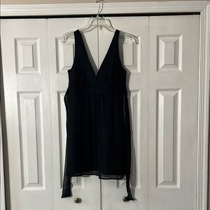 Black A-line sleeveless V-Neck dress.